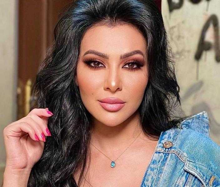 بالأحمر الناري.. ميرهان حسين تستعرض جمالها بلوك جذاب | شاهد