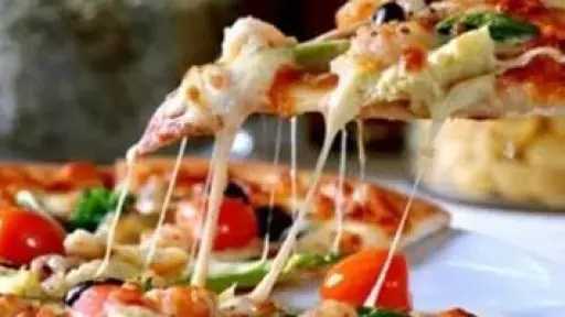 احصلي على أسرار تحضير البيتزا الإيطالية الأصلية في المنزل بخطوات سهلة ومكونات... احصلي على أسرار تحضير البيتزا الإيطالية الأصلية في المنزل بخطوات سهلة ومكونات بسيطة