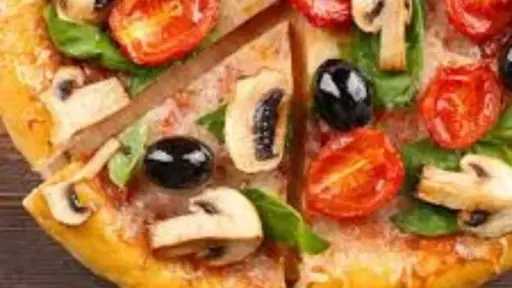 بيتزا الخضار الملونة.. مزيج من الطعم الرائع والصحة والمظهر الجذاب