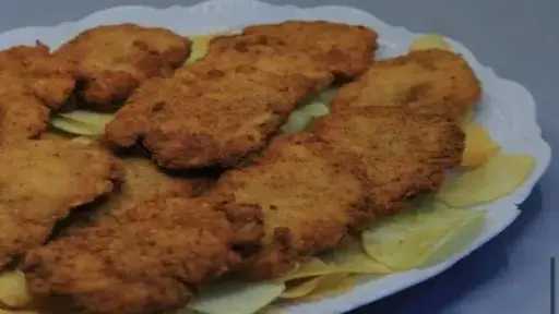 دجاج بانيه بالبطاطس.. وجبة اقتصادية بمذاق شهي وسهلة التحضير في المنزل