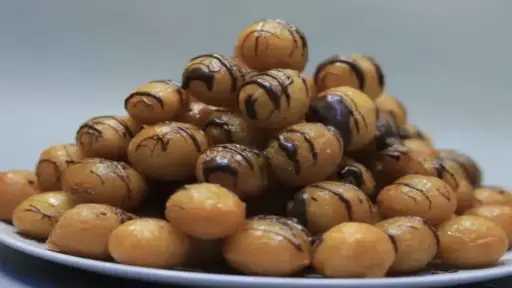 زلابية الشوكولاتة والسكر.. وصفة رمضانية شهية تحضرها بسهولة في المنزل زلابية الشوكولاتة والسكر.. وصفة رمضانية شهية تحضرها بسهولة في المنزل