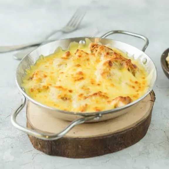 بمذاق المطاعم.. أسرار تحضير ”طاسة البطاطس بالجبنة” في المنزل