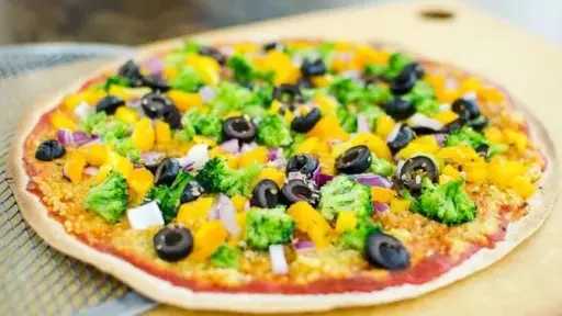 للخروج من ملل أطعمة العيد.. طريقة عمل بيتزا بالخضروات بخطوات بسيطة للخروج من ملل أطعمة العيد.. طريقة عمل بيتزا بالخضروات بخطوات بسيطة