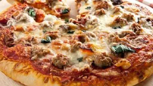 بيتزا تشيكن رانش بالطعم الأصلي من مطبخك.. طريقة التحضير خطوة بخطوة