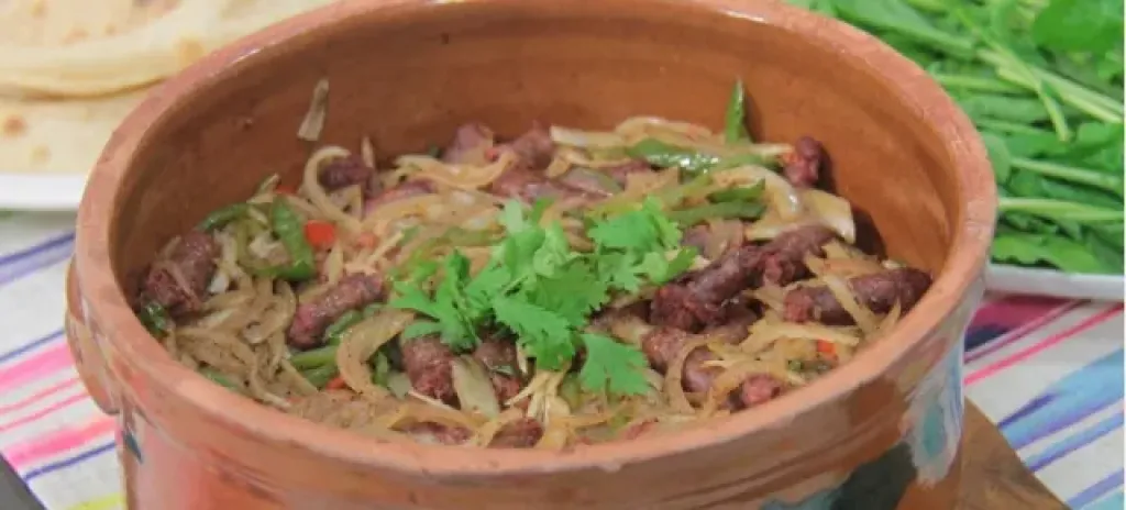 طاجن السجق بدبس الرمان