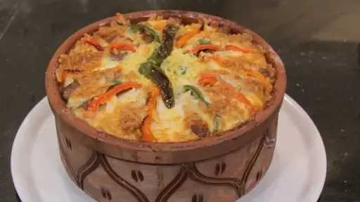 طريقة عمل طاجن الأرز المعمر باللحم بخطوات سهلة وبسيطة