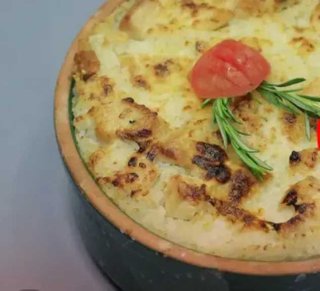 أرز معمر بالدجاج والقشطة.. وصفة غنية بالنكهة تضيف لمائدتك تميزًا