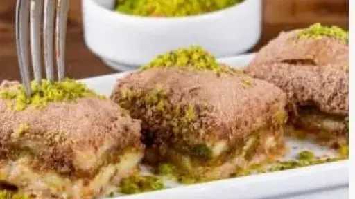 حلوى باردة بالحليب والبسكويت.. وصفة سهلة ومنعشة بدون فرن حلوى باردة بالحليب والبسكويت.. وصفة سهلة ومنعشة بدون فرن